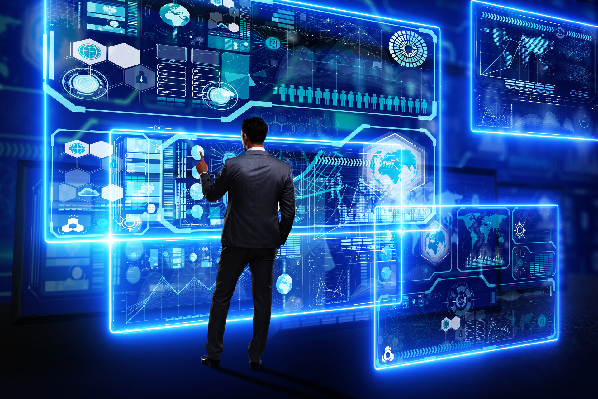 A man in a suit interacting with a futuristic digital dashboard filled with various data visualizations.
